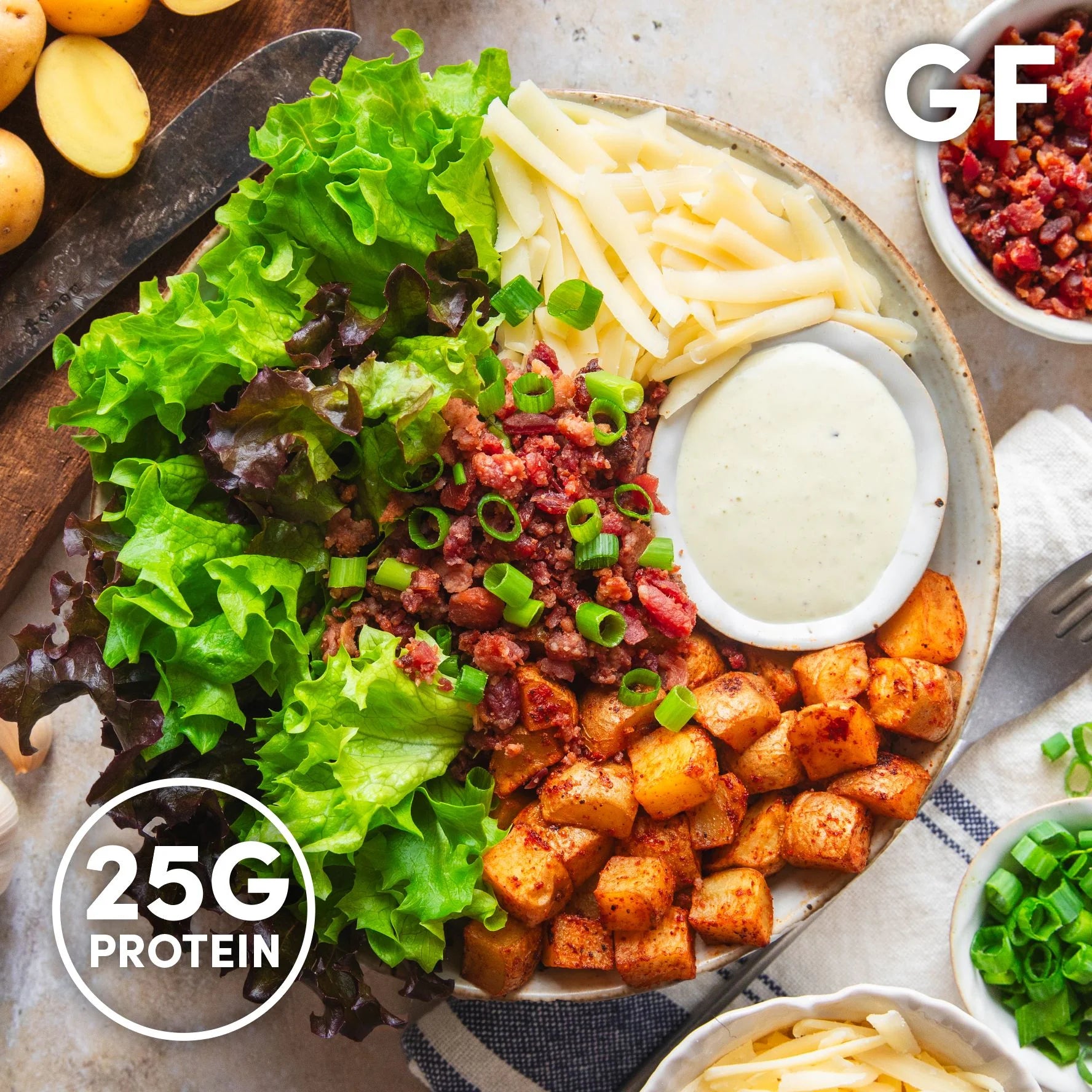 Overhead image of InspiredGo salads made with leafy greens, grains, and fresh toppings like chickpeas, eggs, and roasted vegetables — a high-fiber, protein-rich meal option.